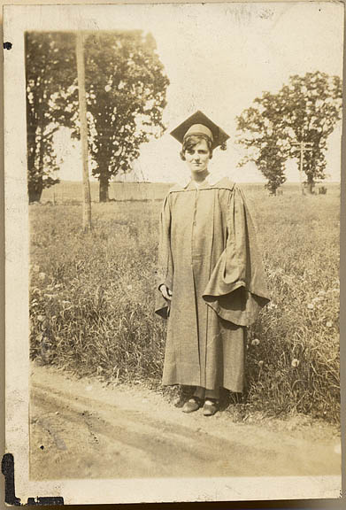 Marion Stebbins in High School graduation cap and gown 