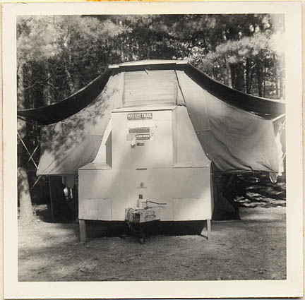 1950s trailer with bumper stickers
