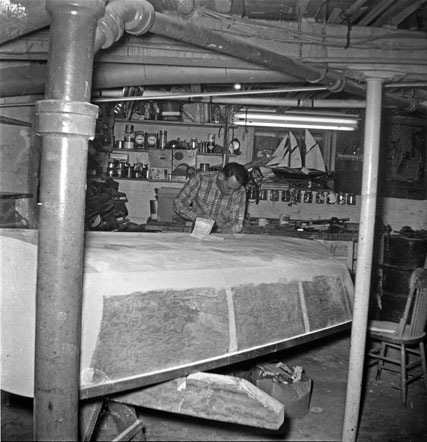 1958 James Jr. building motor boat