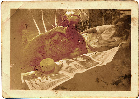 Bertha Davis Parsons and James Parsons Sr. reading the paper