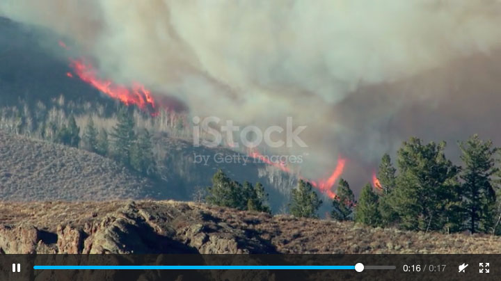 Wildfire smoke fills the morning air in Jasper National Park as the author hikes over the Maccarib Pass.